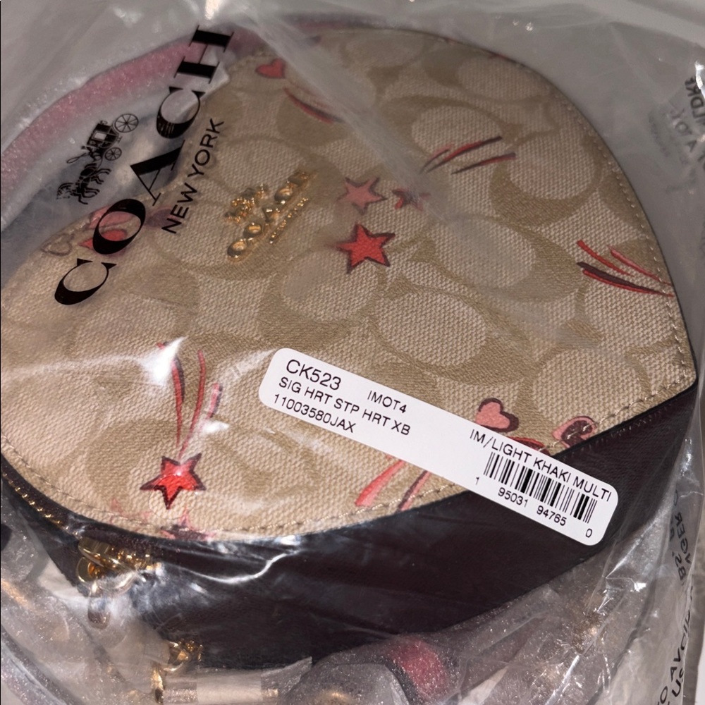 Coach Heart Crossbody In Signature
Canvas With Heart And Star Print nwt - Picture 9 of 11